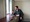 Image of a man looking at his phone.